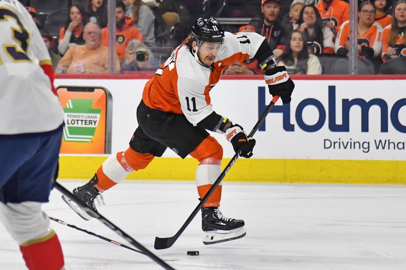 Mar 24, 2024; Philadelphia, Pennsylvania, USA; Philadelphia Flyers right wing Travis Konecny (11) takes a shot on goal against the Florida Panthers during the first period at Wells Fargo Center. Mandatory Credit: Eric Hartline-USA TODAY Sports