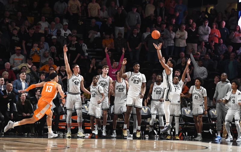 Feb 8, 2023; Nashville, Tennessee, USA; Vanderbilt Commodores guard Tyrin Lawrence (0) makes the game-winning three-pointer at the buzzer to bear the Tennessee Volunteers at Memorial Gymnasium. Mandatory Credit: Christopher Hanewinckel-USA TODAY Sports