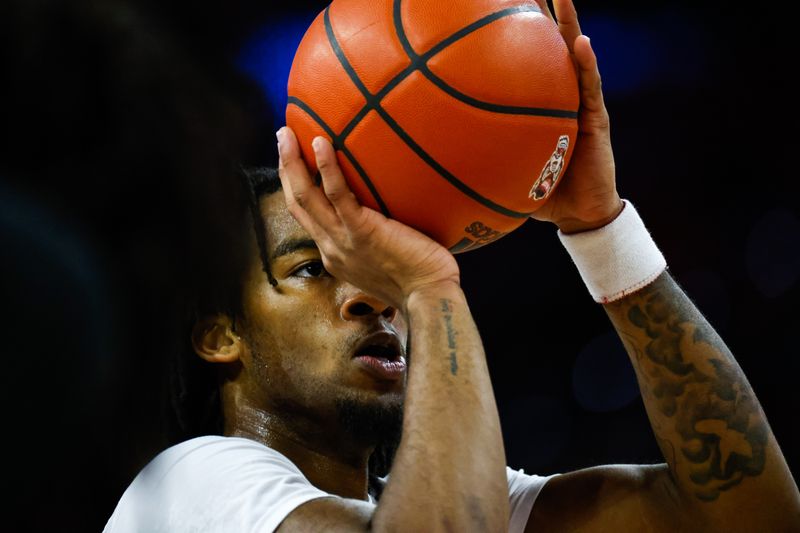 Dec 20, 2023; Raleigh, North Carolina, USA; North Carolina State Wolfpack guard Jayden Taylor (1) shoots the ball during the first half against Saint Louis at PNC Arena. Mandatory Credit: Jaylynn Nash-USA TODAY Sports