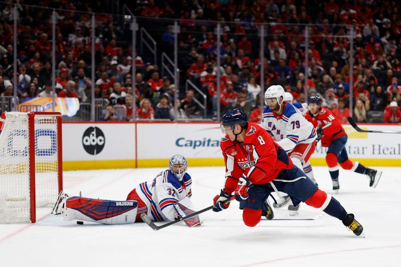 Jan 4, 2025; Washington, District of Columbia, USA; Washington Capitals left wing Alex Ovechkin (8) scores a goal on New York Rangers goaltender Jonathan Quick (32) in the third period at Capital One Arena. Mandatory Credit: Geoff Burke-Imagn Images