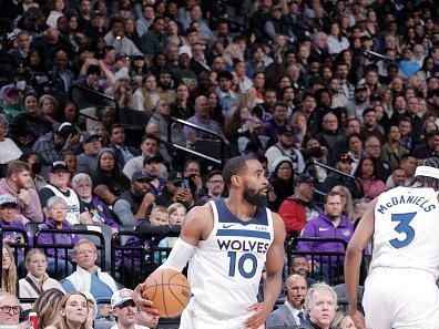 SACRAMENTO, CA - DECEMBER 23: Mike Conley #10 of the Minnesota Timberwolves dribbles the ball during the game against the Sacramento Kings on December 23, 2023 at Golden 1 Center in Sacramento, California. NOTE TO USER: User expressly acknowledges and agrees that, by downloading and or using this Photograph, user is consenting to the terms and conditions of the Getty Images License Agreement. Mandatory Copyright Notice: Copyright 2023 NBAE (Photo by Rocky Widner/NBAE via Getty Images)