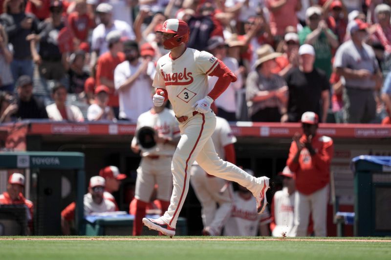 Jun 8, 2025; Anaheim, California, USA; Los Angeles Angels left fielder Taylor Ward (3) runs the bases after hitting a two-run home run in the fourth inning against the Seattle Mariners at Angel Stadium. Mandatory Credit: Kirby Lee-Imagn Images