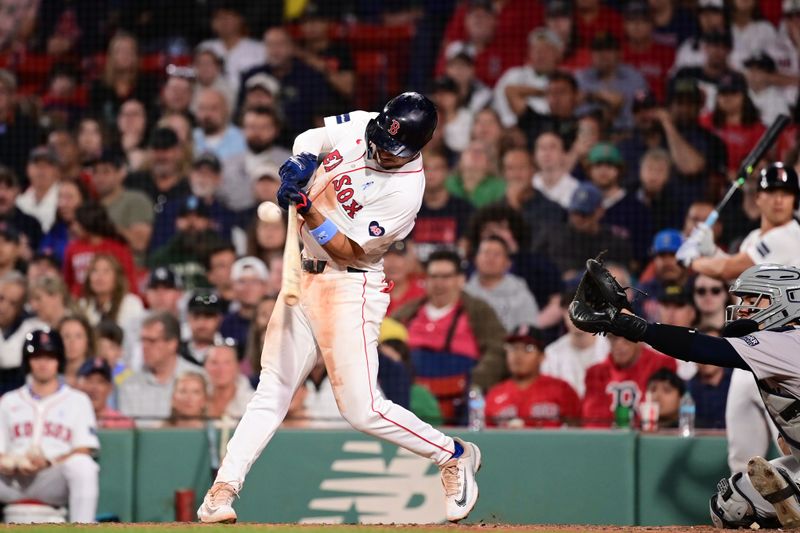 Jun 16, 2024; Boston, Massachusetts, USA; Boston Red Sox shortstop David Hamilton (70) hits an RBI single against the New York Yankees during the eighth inning at Fenway Park. Mandatory Credit: Eric Canha-USA TODAY Sports