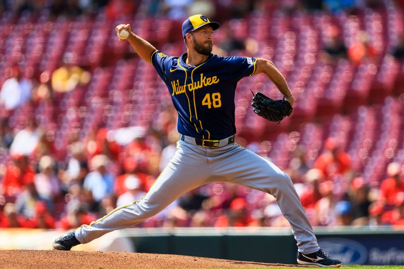 Aug 30, 2024; Cincinnati, Ohio, USA; Milwaukee Brewers starting pitcher Colin Rea (48) pitches against the Cincinnati Reds in the first inning at Great American Ball Park. Mandatory Credit: Katie Stratman-USA TODAY Sports