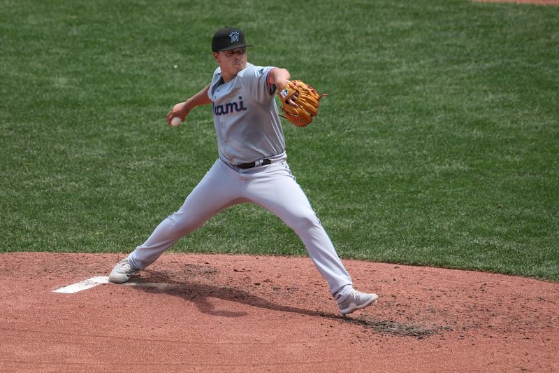 Jun 26, 2024; Kansas City, Missouri, USA; Miami Marlins pitcher Valente Bellozo (83) throws against the Kansas City Royals during the fifth inning at Kauffman Stadium. Mandatory Credit: William Purnell-USA TODAY Sports