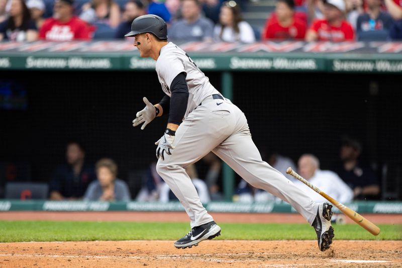 Apr 14, 2024; Cleveland, Ohio, USA; New York Yankees first baseman Anthony Rizzo (48) hits a two-run RBI single during the tenth inning against the Cleveland Guardians at Progressive Field. Mandatory Credit: Scott Galvin-USA TODAY Sports