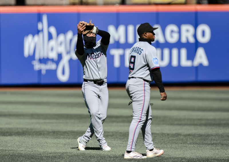 Apr 9, 2025; New York City, New York, USA; Miami Marlins second baseman Javier Sanoja (46) catches a pop fly hit by New York Mets third baseman Brett Baty (not pictured) during the eighth inning at Citi Field. Mandatory Credit: John Jones-Imagn Images