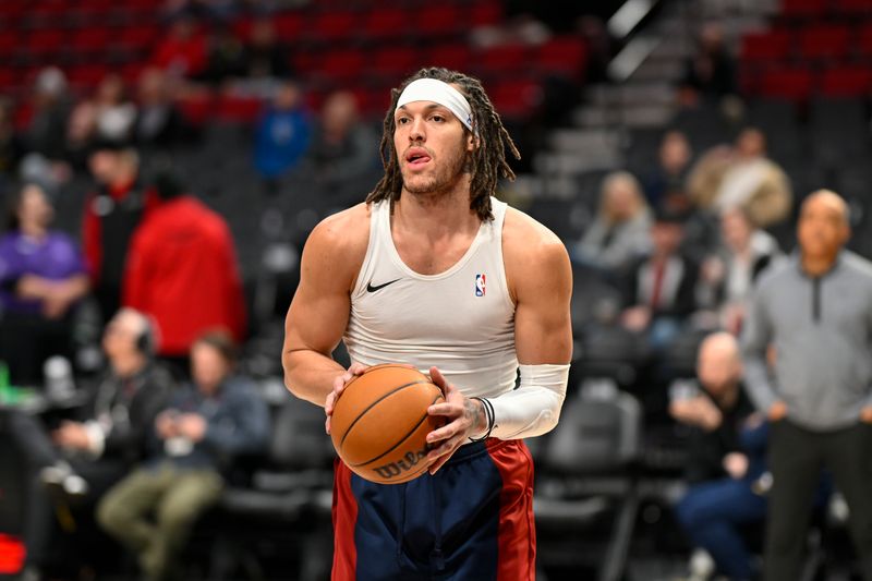 PORTLAND, OREGON - MARCH 23: Aaron Gordon #50 of the Denver Nuggets warms up before the game against the Portland Trail Blazers at the Moda Center on March 23, 2024 in Portland, Oregon. NOTE TO USER: User expressly acknowledges and agrees that, by downloading and or using this photograph, User is consenting to the terms and conditions of the Getty Images License Agreement. (Photo by Alika Jenner/Getty Images)