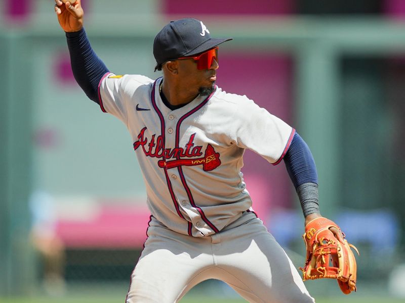 Jul 30, 2025; Kansas City, Missouri, USA; Atlanta Braves second baseman Ozzie Albies (1) throws to first base during the seventh inning against the Kansas City Royals at Kauffman Stadium. Mandatory Credit: Jay Biggerstaff-Imagn Images