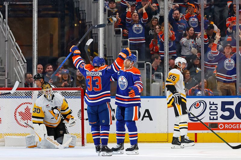 Oct 25, 2024; Edmonton, Alberta, CAN; The Edmonton Oilers celebrate a goal scored by defensemen Evan Bouchard (2) during the second period against the Pittsburgh Penguins at Rogers Place. Mandatory Credit: Perry Nelson-Imagn Images