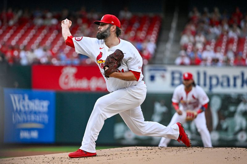 Jul 30, 2024; St. Louis, Missouri, USA;  St. Louis Cardinals starting pitcher Lance Lynn (31) pitches against the Texas Rangers during the first inning at Busch Stadium. Mandatory Credit: Jeff Curry-USA TODAY Sports