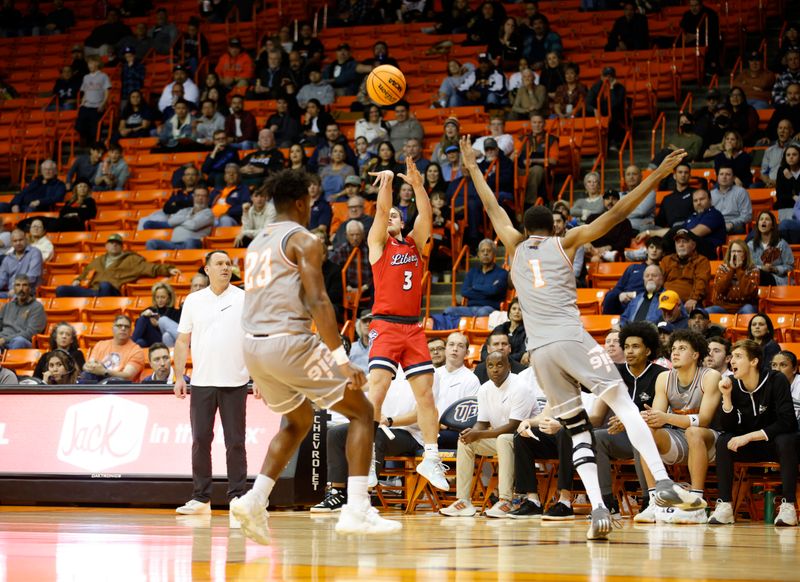 Feb 3, 2024; El Paso, Texas, USA; Liberty University Flames guard Kaden Metheny (3) shoots the ball against the UTEP Miners defense in the first half at Don Haskins Center. Mandatory Credit: Ivan Pierre Aguirre-USA TODAY Sports