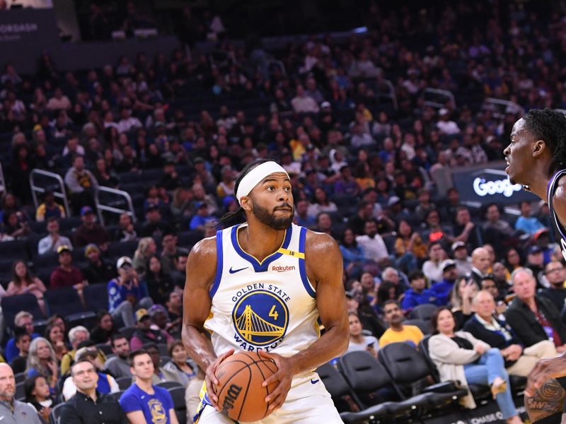 SAN FRANCISCO, CA - OCTOBER 11: Moses Moody #4 of the Golden State Warriors handles the ball during the game against the Sacramento Kings during a NBA Preseason game on October 11, 2024 at Chase Center in San Francisco, California. NOTE TO USER: User expressly acknowledges and agrees that, by downloading and or using this photograph, user is consenting to the terms and conditions of Getty Images License Agreement. Mandatory Copyright Notice: Copyright 2024 NBAE (Photo by Noah Graham/NBAE via Getty Images)