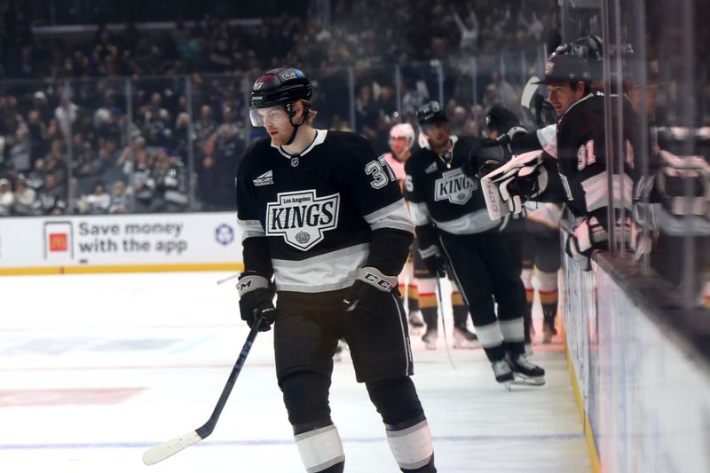 Oct 30, 2024; Los Angeles, California, USA;  Los Angeles Kings left wing Warren Foegele (37) reacts after scoring a goal during the first period against the Vegas Golden Knights at Crypto.com Arena. Mandatory Credit: Kiyoshi Mio-Imagn Images