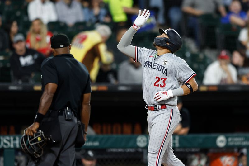 Sep 15, 2023; Chicago, Illinois, USA; Minnesota Twins third baseman Royce Lewis (23) round the bases after hitting a grand slam against the Chicago White Sox during the second inning at Guaranteed Rate Field. Mandatory Credit: Kamil Krzaczynski-USA TODAY Sports