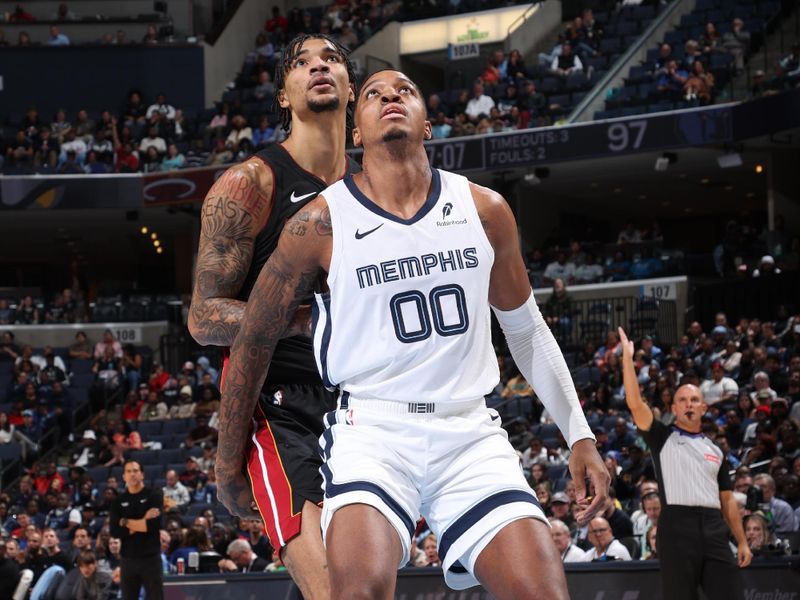 MEMPHIS, TN - OCTOBER 18: Armando Bacot #00 of the Memphis Grizzlies boxes out during the game against the Miami Heat during a NBA pre season game on October 18, 2024 at FedExForum in Memphis, Tennessee. NOTE TO USER: User expressly acknowledges and agrees that, by downloading and or using this photograph, User is consenting to the terms and conditions of the Getty Images License Agreement. Mandatory Copyright Notice: Copyright 2024 NBAE (Photo by Joe Murphy/NBAE via Getty Images)