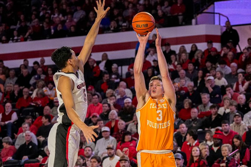 Jan 13, 2024; Athens, Georgia, USA; Tennessee Volunteers guard Dalton Knecht (3) shoots over Georgia Bulldogs guard RJ Melendez (15) during the first half at Stegeman Coliseum. Mandatory Credit: Dale Zanine-USA TODAY Sports