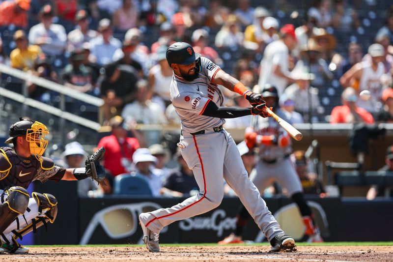 Sep 8, 2024; San Diego, California, USA; San Francisco Giants right fielder Jerar Encarnacion (59) hits a three run home run during the fourth inning against the San Diego Padres at Petco Park. Mandatory Credit: Chadd Cady-Imagn Images