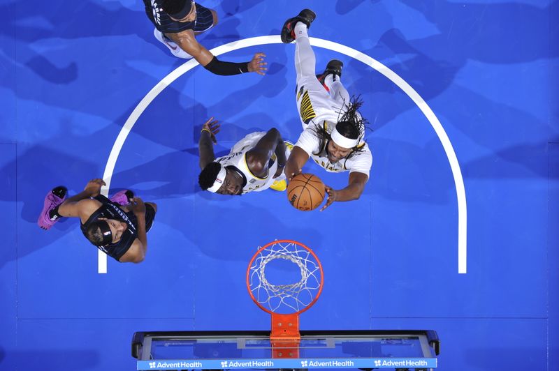 ORLANDO, FL - OCTOBER 28: Myles Turner #33 of the Indiana Pacers drives to the basket during the game against the Orlando Magic on October 28, 2024 at Kia Center in Orlando, Florida. NOTE TO USER: User expressly acknowledges and agrees that, by downloading and or using this photograph, User is consenting to the terms and conditions of the Getty Images License Agreement. Mandatory Copyright Notice: Copyright 2024 NBAE (Photo by Fernando Medina/NBAE via Getty Images)
