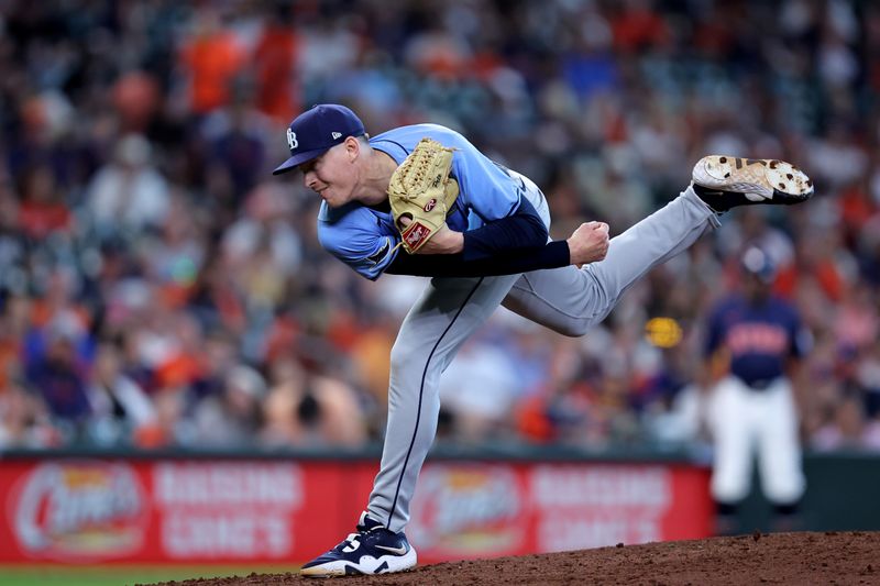 Aug 4, 2024; Houston, Texas, USA; Tampa Bay Rays relief pitcher Pete Fairbanks (29) delivers a pitch against the Houston Astros during the ninth inning at Minute Maid Park. Mandatory Credit: Erik Williams-USA TODAY Sports