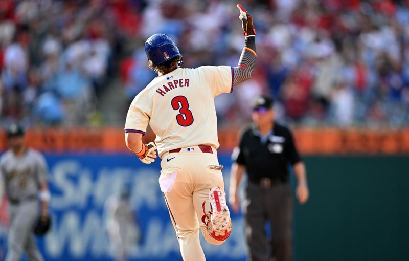 Jul 13, 2024; Philadelphia, Pennsylvania, USA; Philadelphia Phillies first baseman Bryce Harper (3) reacts as he rounds the bases after hitting a home run against the Oakland Athletics in the seventh inning at Citizens Bank Park. Mandatory Credit: Kyle Ross-USA TODAY Sports