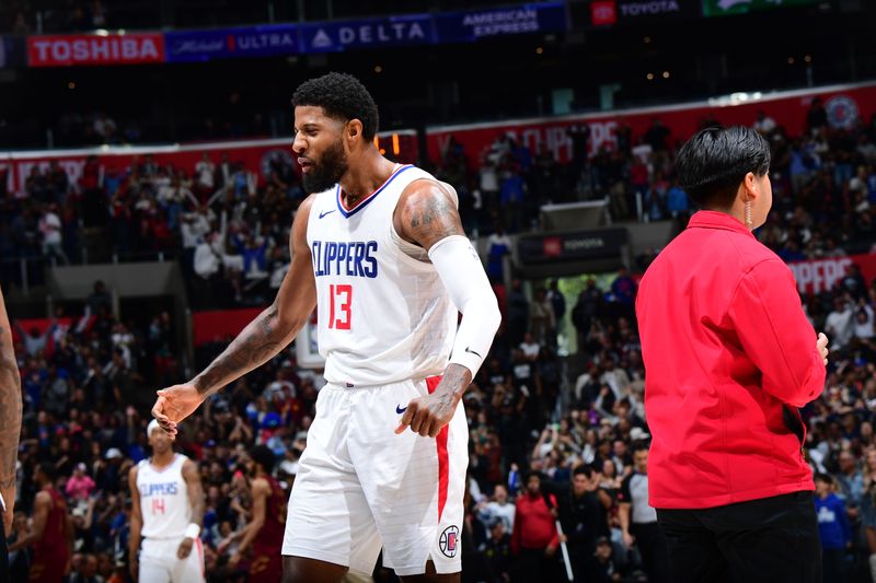 LOS ANGELES, CA - APRIL 7: Paul George #13 of the LA Clippers celebrates after making the game winning shot during the game against the Cleveland Cavaliers on April 7, 2024 at Crypto.Com Arena in Los Angeles, California. NOTE TO USER: User expressly acknowledges and agrees that, by downloading and/or using this Photograph, user is consenting to the terms and conditions of the Getty Images License Agreement. Mandatory Copyright Notice: Copyright 2024 NBAE (Photo by Adam Pantozzi/NBAE via Getty Images)