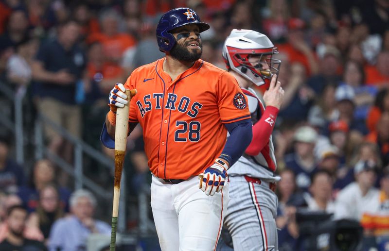 May 31, 2024; Houston, Texas, USA; Houston Astros first baseman Jon Singleton (28) reacts after striking out during the sixth inning against the Minnesota Twins at Minute Maid Park. Mandatory Credit: Troy Taormina-USA TODAY Sports