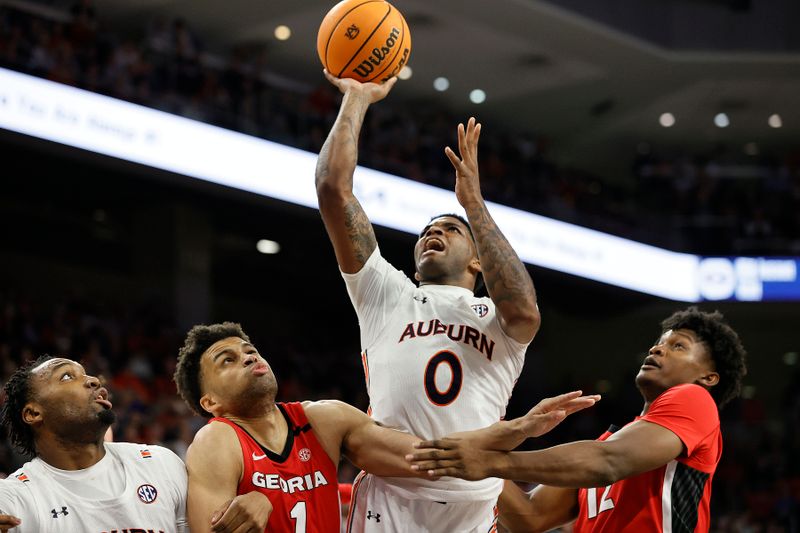 Feb 1, 2023; Auburn, Alabama, USA;  Auburn Tigers guard K.D. Johnson (0) takes a shot against the Georgia Bulldogs during the second half at Neville Arena. Mandatory Credit: John Reed-USA TODAY Sports