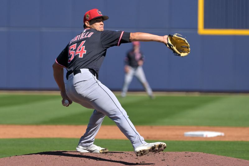 Feb 21, 2026; Phoenix, Arizona, USA;  Cleveland Guardians pitcher Joey Cantillo (54) delivers to the plate in the first inning against the against the Milwaukee Brewers at American Family Fields of Phoenix. Mandatory Credit: Jayne Kamin-Oncea-Imagn Images