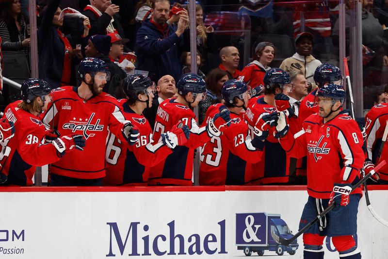 Mar 1, 2024; Washington, District of Columbia, USA; Washington Capitals left wing Alex Ovechkin (8) celebrates with teammates after scoring a goal against the Philadelphia Flyers in the second period at Capital One Arena. Mandatory Credit: Geoff Burke-USA TODAY Sports