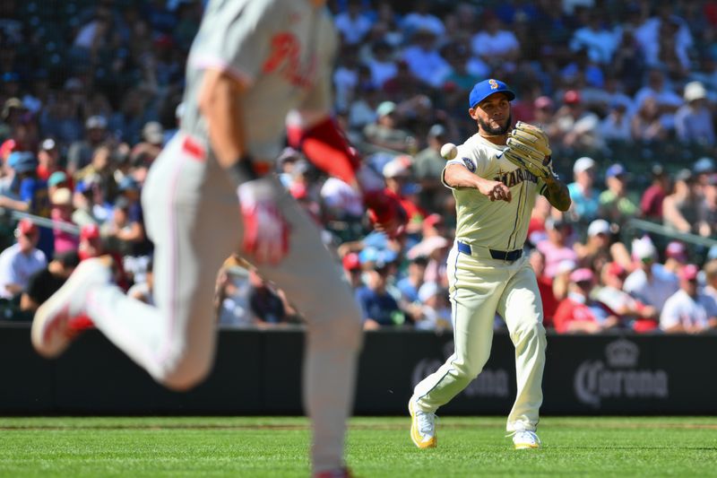 Aug 4, 2024; Seattle, Washington, USA; Seattle Mariners relief pitcher Jonathan Hernandez (72) throws the ball to first base during the ninth inning against the Philadelphia Phillies at T-Mobile Park. Mandatory Credit: Steven Bisig-USA TODAY Sports