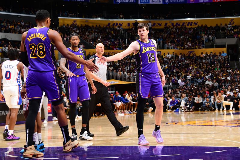 LOS ANGELES, CA - MARCH 22: Austin Reaves #15 and Rui Hachimura #28 of the Los Angeles Lakers high five during the game against the Philadelphia 76ers on March 22, 2024 at Crypto.Com Arena in Los Angeles, California. NOTE TO USER: User expressly acknowledges and agrees that, by downloading and/or using this Photograph, user is consenting to the terms and conditions of the Getty Images License Agreement. Mandatory Copyright Notice: Copyright 2024 NBAE (Photo by Adam Pantozzi/NBAE via Getty Images)