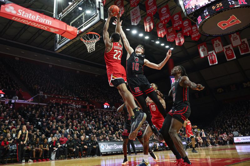 Feb 25, 2024; Piscataway, New Jersey, USA; Maryland Terrapins forward Jordan Geronimo (22) drives for a shot against Rutgers Scarlet Knights guard Gavin Griffiths (10) and center Clifford Omoruyi (11) during the first half at Jersey Mike's Arena. Mandatory Credit: Vincent Carchietta-USA TODAY Sports