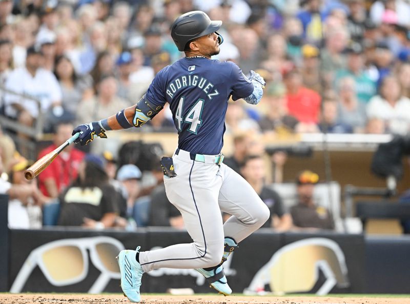 Jun 9, 2024; San Diego, California, USA; Seattle Mariners center fielder Julio Rodriguez (44) hits a single during the third inning against the San Diego Padres at Petco Park. Mandatory Credit: Denis Poroy-USA TODAY Sports at Petco Park. 