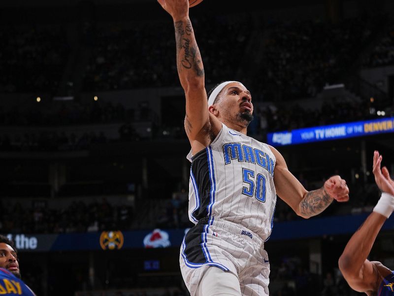 DENVER, CO - JANUARY 5: Cole Anthony #50 of the Orlando Magic shoots the ball during the game against the Denver Nuggets on January 5, 2024 at the Ball Arena in Denver, Colorado. NOTE TO USER: User expressly acknowledges and agrees that, by downloading and/or using this Photograph, user is consenting to the terms and conditions of the Getty Images License Agreement. Mandatory Copyright Notice: Copyright 2024 NBAE (Photo by Bart Young/NBAE via Getty Images)