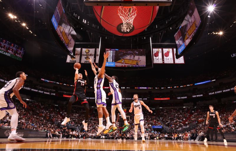 MIAMI, FL - NOVEMBER 4: Tyler Herro #14 of the Miami Heat shoots the ball during the game against the Sacramento Kings during a regular season game on November 4, 2024 at Kaseya Center in Miami, Florida. NOTE TO USER: User expressly acknowledges and agrees that, by downloading and or using this Photograph, user is consenting to the terms and conditions of the Getty Images License Agreement. Mandatory Copyright Notice: Copyright 2024 NBAE (Photo by Issac Baldizon/NBAE via Getty Images)