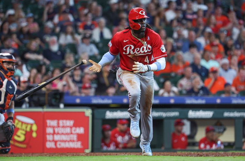 Jun 18, 2023; Houston, Texas, USA; Cincinnati Reds shortstop Elly De La Cruz (44) hits an RBI single during the tenth inning against the Houston Astros at Minute Maid Park. Mandatory Credit: Troy Taormina-USA TODAY Sports