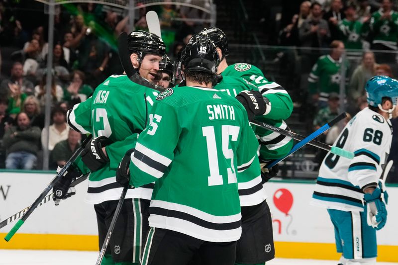Mar 2, 2024; Dallas, Texas, USA;  Dallas Stars center Radek Faksa (12) celebrates with teammates after scoring a goal against the San Jose Sharks during the second period at American Airlines Center. Mandatory Credit: Chris Jones-USA TODAY Sports