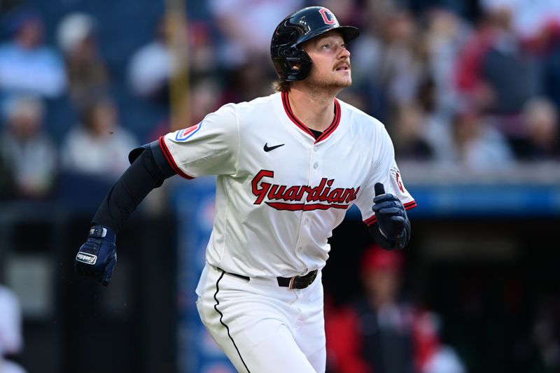 Apr 21, 2025; Cleveland, Ohio, USA; Cleveland Guardians designated hitter Kyle Manzardo (9) watches the ball after hitting a solo home run off New York Yankees starting pitcher Clarke Schmidt (36) during the third inning at Progressive Field. Mandatory Credit: David Dermer-Imagn Images