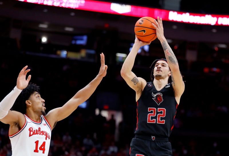 Dec 8, 2022; Columbus, Ohio, USA; Rutgers Scarlet Knights guard Caleb McConnell (22) takes a jump shot as Ohio State Buckeyes forward Justice Sueing (14) defends during the first half at Value City Arena. Mandatory Credit: Joseph Maiorana-USA TODAY Sports