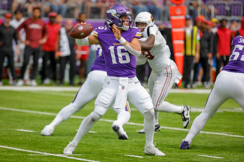 Minnesota Vikings quarterback Jaren Hall (16) passes against the Arizona Cardinals during the first half of an NFL preseason football game, Saturday, Aug. 26, 2023, in Minneapolis. (AP Photo/Bruce Kluckhohn)