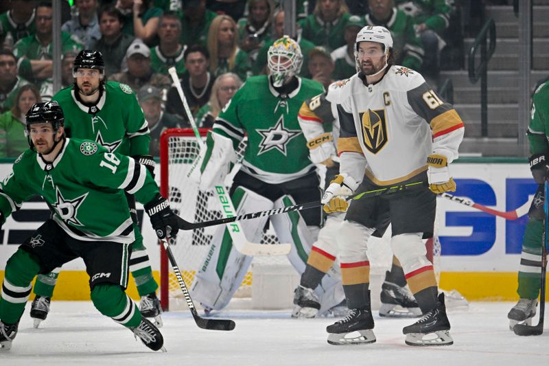 May 1, 2024; Dallas, Texas, USA; Dallas Stars center Sam Steel (18) and defenseman Chris Tanev (3) and goaltender Jake Oettinger (29) and Vegas Golden Knights right wing Mark Stone (61) look for the puck in the Dallas zone during the second period in game five of the first round of the 2024 Stanley Cup Playoffs at the American Airlines Center. Mandatory Credit: Jerome Miron-USA TODAY Sports