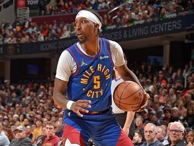 CLEVELAND, OH - NOVEMBER 19: Kentavious Caldwell-Pope #5 of the Denver Nuggets dribbles the ball during the game against the Cleveland Cavaliers on November 19, 2023 at Rocket Mortgage FieldHouse in Cleveland, Ohio. NOTE TO USER: User expressly acknowledges and agrees that, by downloading and/or using this Photograph, user is consenting to the terms and conditions of the Getty Images License Agreement. Mandatory Copyright Notice: Copyright 2023 NBAE (Photo by David Liam Kyle/NBAE via Getty Images)