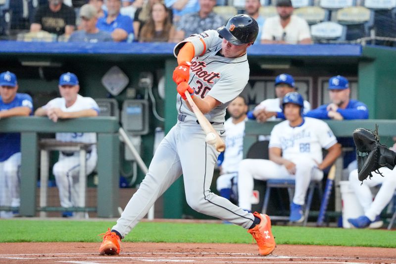 Sep 16, 2024; Kansas City, Missouri, USA; Detroit Tigers designated hitter Kerry Carpenter (30) hits a single against the Kansas City Royals in the first inning at Kauffman Stadium. Mandatory Credit: Denny Medley-Imagn Images