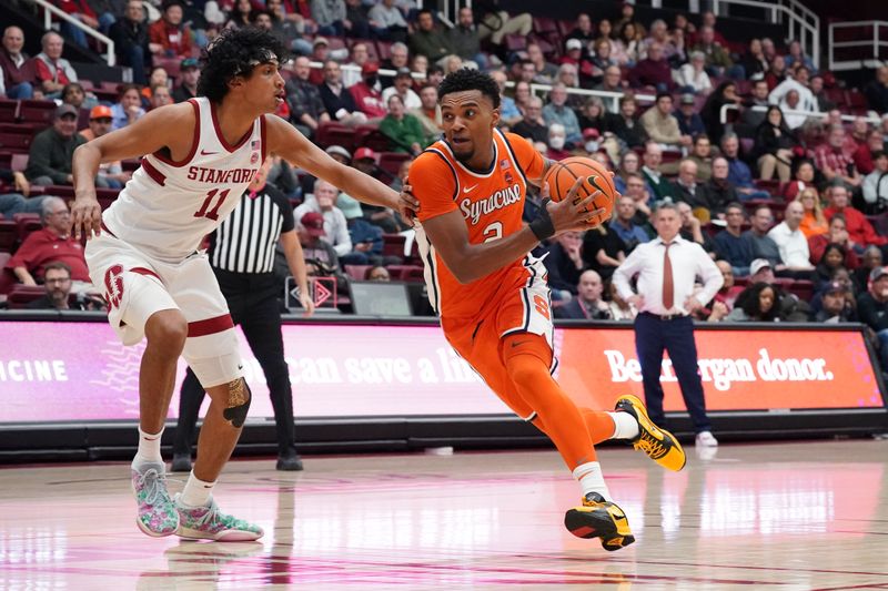 Jan 29, 2025; Stanford, California, USA;  Syracuse Orange guard J.J. Starling (2) drives on Stanford Cardinal guard Ryan Agarwal (11) in the second half at Maples Pavilion. Mandatory Credit: David Gonzales-Imagn Images