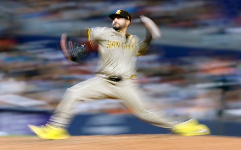 Aug 9, 2024; Miami, Florida, USA;  San Diego Padres starting pitcher Martin Perez (54) delivers a pitch against the Miami Marlins in the seventh inning at loanDepot Park. Mandatory Credit: Rhona Wise-USA TODAY Sports