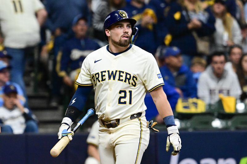 Oct 14, 2025; Milwaukee, Wisconsin, USA; Milwaukee Brewers third baseman Caleb Durbin (21) reacts after striking out against the Los Angeles Dodgers in the fourth inning during game two of the NLCS round for the 2025 MLB playoffs at American Family Field. Mandatory Credit: Benny Sieu-Imagn Images