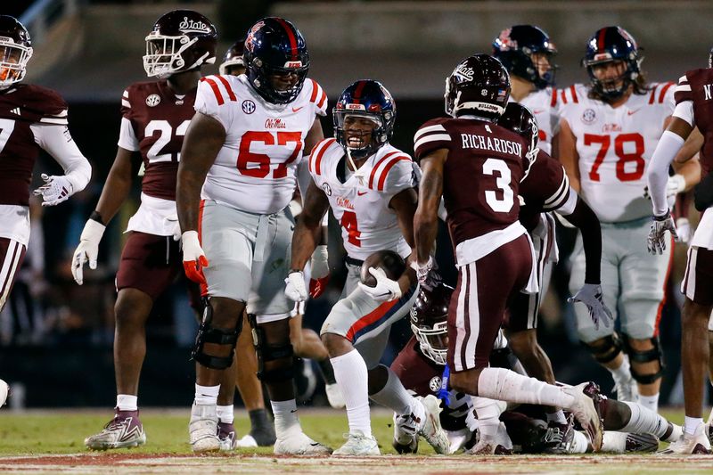 Nov 23, 2023; Starkville, Mississippi, USA; Mississippi Rebels running back Quinshon Judkins (4) reacts after running the ball during the first half against the Mississippi State Bulldogs at Davis Wade Stadium at Scott Field. Mandatory Credit: Petre Thomas-USA TODAY Sports