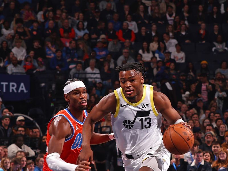 OKLAHOMA CITY, OK - DECEMBER 3: Isaiah Collier #13 of the Utah Jazz drives to the basket during the game against the Oklahoma City Thunder during the Emirates NBA Cup game on on December 3, 2024 at Paycom Center in Oklahoma City, Oklahoma. NOTE TO USER: User expressly acknowledges and agrees that, by downloading and or using this photograph, User is consenting to the terms and conditions of the Getty Images License Agreement. Mandatory Copyright Notice: Copyright 2024 NBAE (Photo by Zach Beeker/NBAE via Getty Images)