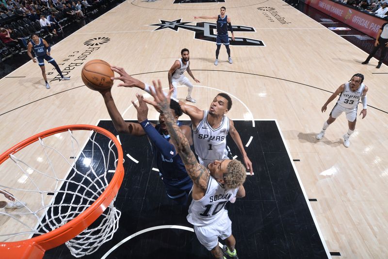 SAN ANTONIO, TX - MARCH 22  Victor Wembanyama #1 of the San Antonio Spurs blocks the shot of Jaren Jackson Jr. #13 of the Memphis Grizzlies on March 22, 2024 at the Frost Bank Center in San Antonio, Texas. NOTE TO USER: User expressly acknowledges and agrees that, by downloading and or using this photograph, user is consenting to the terms and conditions of the Getty Images License Agreement. Mandatory Copyright Notice: Copyright 2024 NBAE (Photos by Michael Gonzales/NBAE via Getty Images)